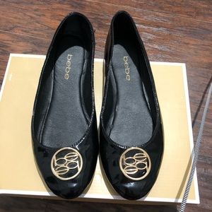 Bebe black flats 7.5